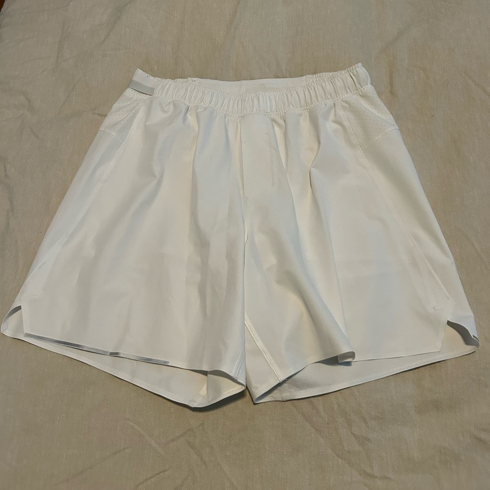 Men’s Lululemon Surge Short. Size M. Liner. Color: white. 6” inseam
